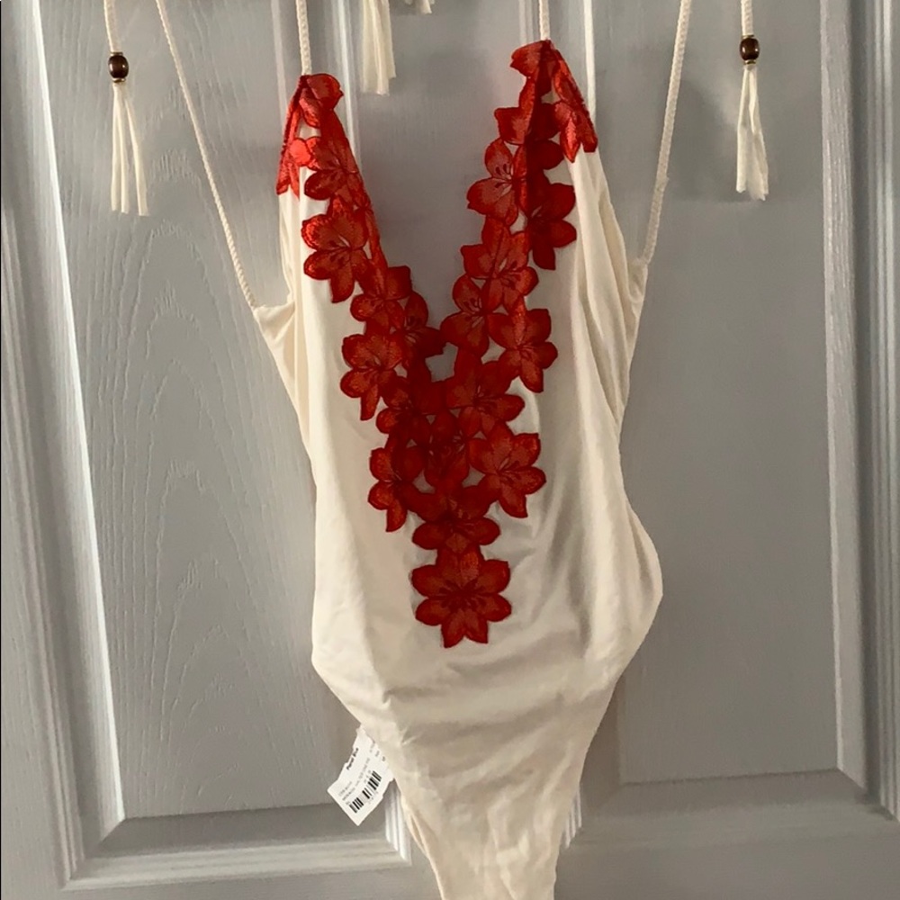 Never worn, with tags! Blue Life Mirage one piece